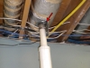 central vacuum discharge is vented into the combustion air pipe for the furnace