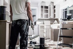 Man Painting a Modern Kitchen