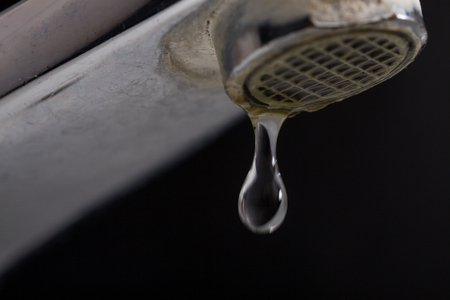 Hard Water Running from Faucet