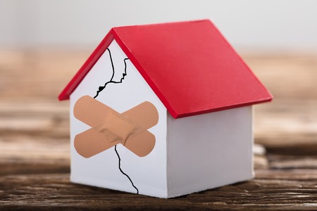 Broken House with Cracks