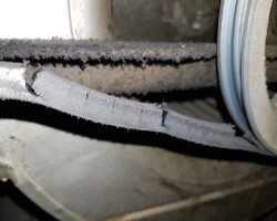 Damaged-belt-on-old-furnace