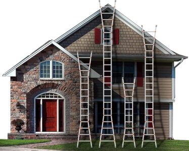 This wonderful extension ladder will fit in the trunk of our car!  It extends to 22 feet. A house with four telescoping ladders of different heights placed in front of it on the lawn.