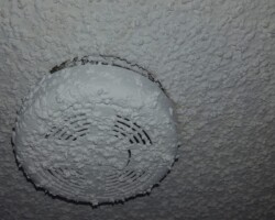 Stippled-and-expired-smoke-detector