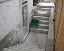 Inspecting a basement entrance